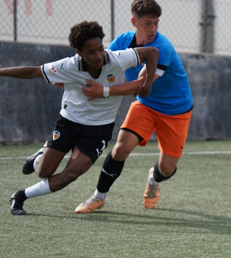 children playing football